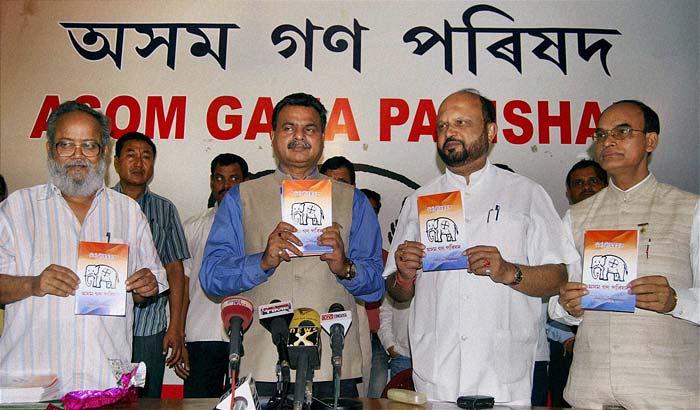 Asom Gana Paraishad (AGP) President Chandra Mohan Patowari (second left) with Prafulla Kumar Mahanta (second right) and other senior leaders releasing the party's manifesto in Guwahati for the upcoming Assam assembly polls. (PTI)