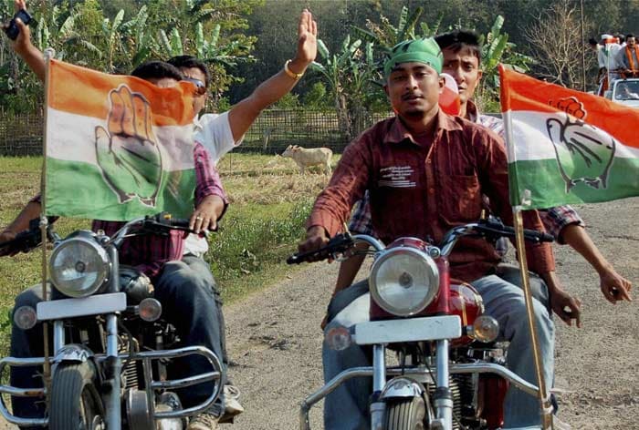 Congress supporters take out a motorcycle rally in Amguri in support of party candidate Anjan Dutta from Amguri LAC ahead of the assembly elections in Assam. (PTI)