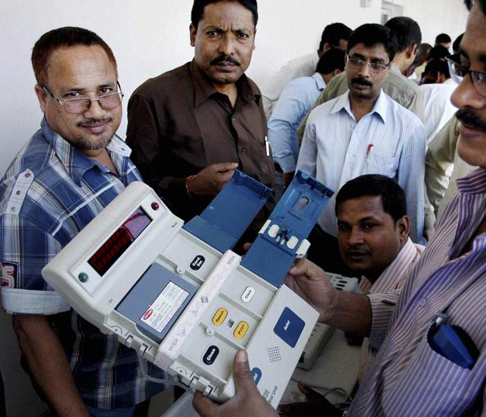 An EVM expert trains polling and presiding officers during a training programme in Guwahati for the upcoming Assam assembly elections. (PTI)