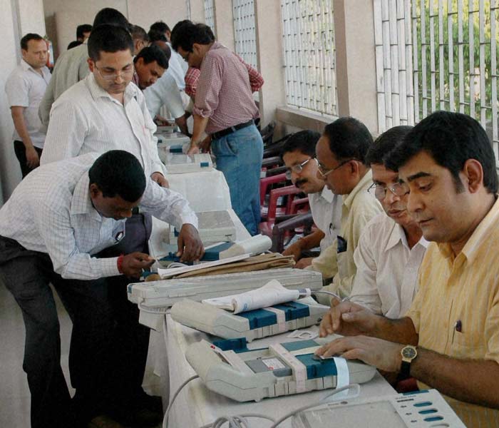 EVM experts train polling and presiding officers during a training programme in the Kamrup district for the upcoming Assam assembly elections. (PTI)