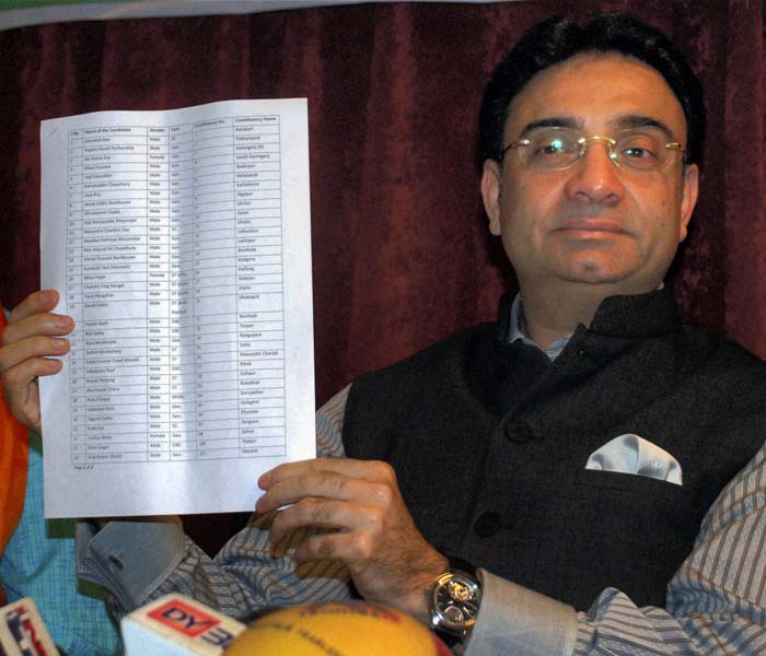KD Singh, North-East Observer of the Trinamool Congress, releases the first list of candidates for the forthcoming Assam assembly elections during a press conference in Guwahati. (PTI)