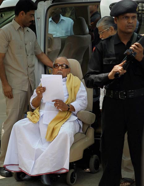 DMK supremo and Tamil Nadu Chief Minister M Karunanidhi arrives at a press conference in Chennai to announce the names of candidates for the Tamil Nadu assembly elections. (PTI)