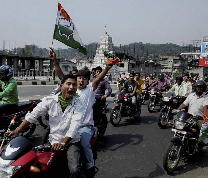 Congress supporters take out a motorcycle rally during a campaign in support of Akon Bora from the Dispur constituency ahead of the upcoming Assam assembly elections in Guwahati. (PTI)