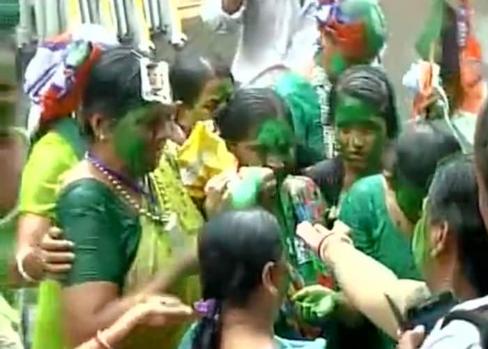 Supporters celebrate outside Mamata Banerjee's residence in Kolkata. The mood is upbeat. <br><br>

(Image Courtesy: <a href="https://twitter.com/ANI_news" target="_blank" rel="nofollow" >ANI</a>)