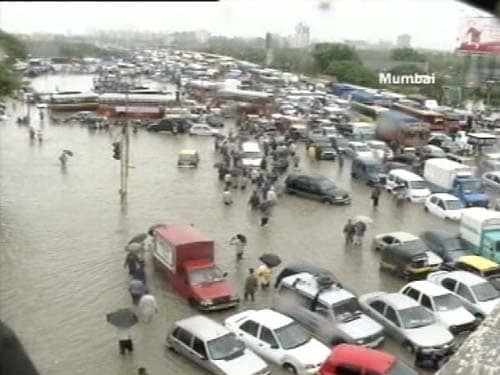 <p>On the roads of Mumbai, rainwater alongwith people, cars and buses remain immoveable- stranded, grounded. (NDTV Photo)</p>
<div><font face="Arial" color="#000000" size="2"></font></div>
<a class="fn fl fa fs12" target="_Blank" href="http://www.ndtv.com/convergence/ndtv/new/india.aspx">Seen worse roads? Share pictures with us.</a>