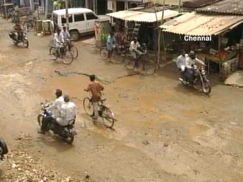 <p>Up and down, and hardly sober- that is a journey on a Chennai roads. (NDTV Photo)</p>
<div><font face="Arial" color="#000000" size="2"></font></div>
<a class="fn fl fa fs12" target="_Blank" href="http://www.ndtv.com/convergence/ndtv/new/india.aspx">Seen worse roads? Share pictures with us.</a>