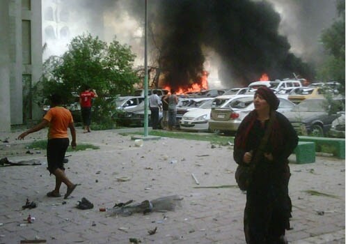 <span class="lh16 fa fs12 fb"><strong>Billowing smoke:</strong> A blaze rages in front of the Iraqi foreign minsitry building following a massive car bomb explosion in central Baghdad. It was the bloodiest day in Iraq since February 2008, coinciding with the sixth anniversary of a truck bombing on the UN compound in Baghdad that killed UN special envoy Sergio Vieira de Mello and 21 other people.(AFP)</span>