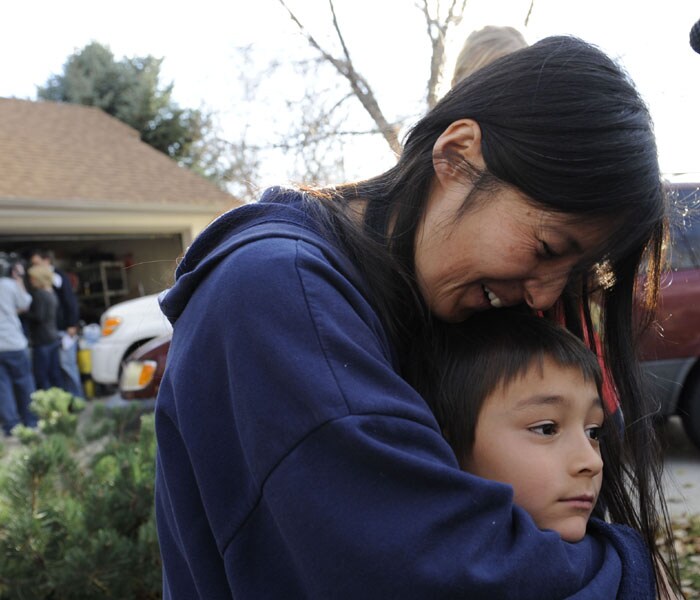 Mom Mayumi Heene gives Falcon a kiss. (NYT Photo)<br />