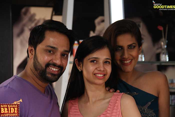 The couple poses with Ambika Anand after their makeovers.