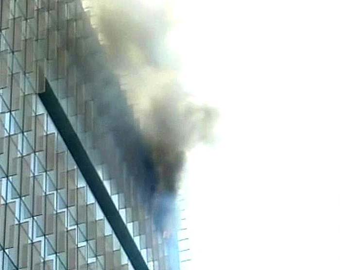 Seven water tankers and seven fire engines are at the spot trying to douse the fire. Flames and smoke can be seen at the windows of the 12th floor. It is not immediately known whether there are people injured or trapped.