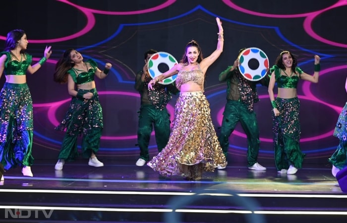 Mallika's electrifying dance performance lit up the stage with energy and grace. She led the troupe with captivating moves, synchronised formations, and unmatched confidence. The vibrant background visuals and dynamic choreography made the performance a showstopper.