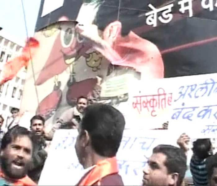 While moving around the New Market area, the activists pulled down a hoarding advertising a coffee-flavoured condom at the City Centre. They also asked theatre owners not to put-up posters of film stars in "offensive" clothes and postures. (NDTV photo)