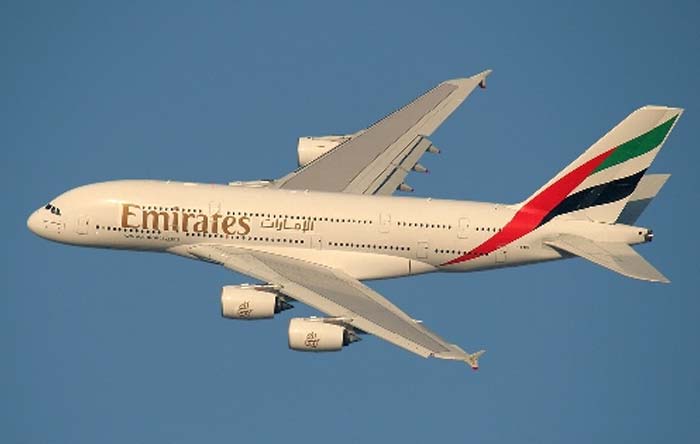 Emirates A-380 flies overhead Dubai.