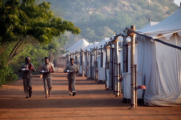 Tea time at Chhatra Sagar. The resort's 14 tents face the dam, which is encircled by a trail. (Courtesy: NYT)