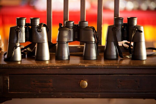 A row of binoculars in the dining tent. (Courtesy: NYT)