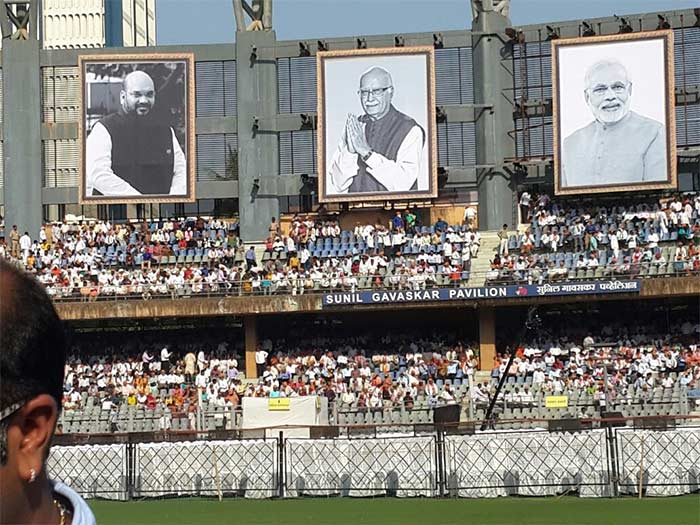 Giant pictures of PM Modi, BJP President Amit Shah and party patriarch LK Advani adorned the stadium