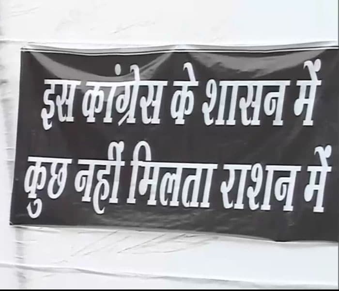 Another banner says: 'Iss Cong ke sashan mein, kuch nahin milta ration mein'.(NDTV photo)