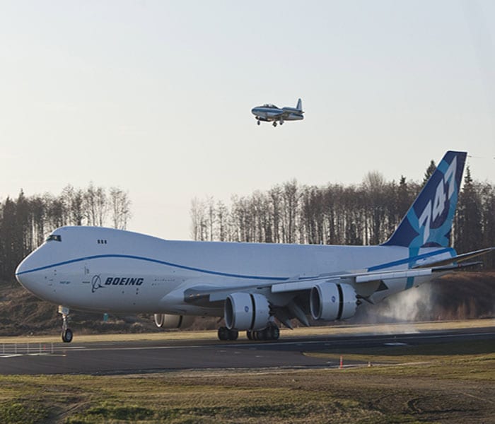 The flight came just one day ahead of the 41st anniversary of the first flight of the original 747 model.<br><br>Seen here, in this picture, Boeing 747-8 freighter landing after its first test flight at Paine Field in Everett, Washington.(AFP Image)