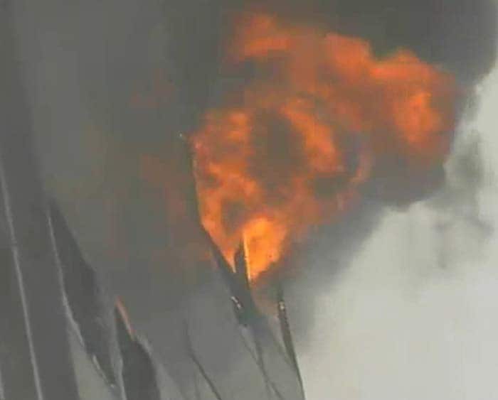 A dozen firemen were left on the rooftop when the dying fire suddenly became stronger due to the winds. One fireman died reportedly due to the smoke that escalated in the top two floors.