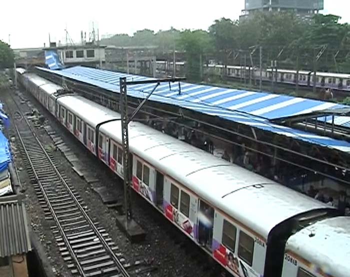 Heavy monsoon showers affected suburban train services on the Central Railway's Main and Harbour lines due to water logging on the tracks. Trains on the Western line are running late by about 10-15 minutes.