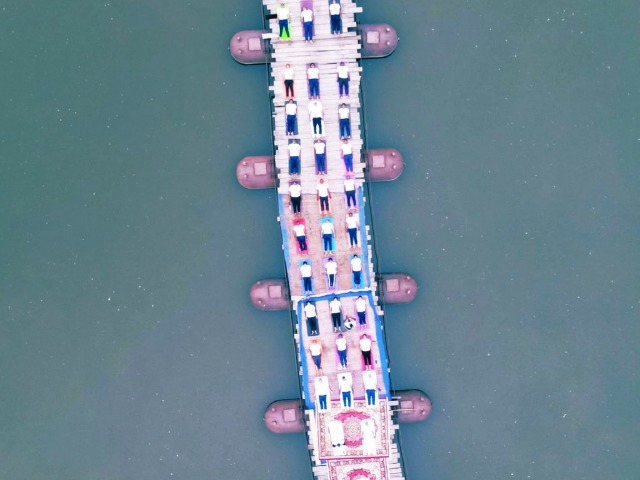 Border Force Personnel Perform Yoga On Floating Bridge In J&K