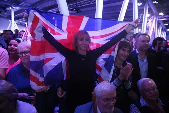 A Brexit supporter holds a Union Flag at a Vote Leave rally in London. (Reuters Photo)