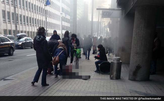 First Pics: Shattered Glass, Smoke At Brussels Airport After Blasts