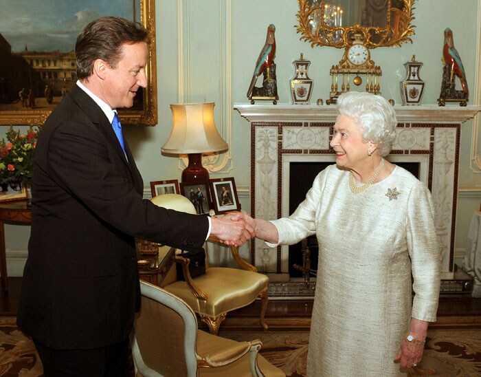 Following tradition, Queen Elizabeth II appointed Cameron as the Prime Minister at Buckingham Palace , after an election that left no party with a majority. (AP Image)