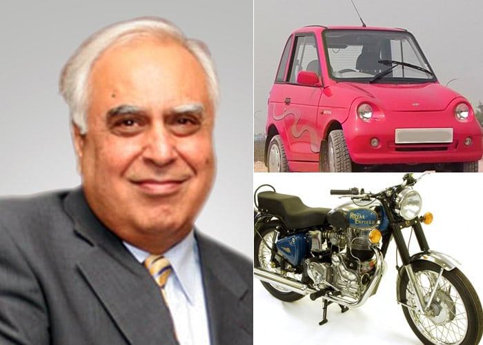 He may not be driving it but a Royal Enfield Bullet is
still part of Minister of Human Resources Development Kapil
Sibal's stable of automobiles. He is the only minister in the
Cabinet to have an eco-friendly electric car Reva among his
six vehicles.
