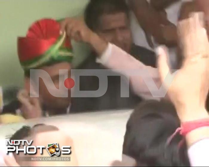 In Uttar Pradesh, it looks like the Samajwadi Party are coasting to an Akhilesh Yadav scripted win. The party workers mobbed the Samajwadi office in Lucknow and 'crowned' Akhilesh Yadav with a turban as he arrived.