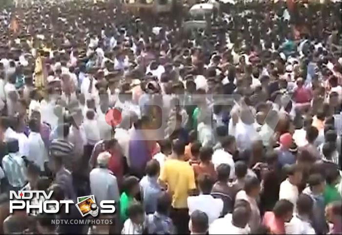 Hundreds of BJP supporters gather outside a counting centre in Goa. The party is leading in the state.