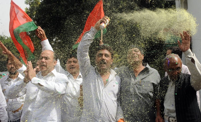 An early Holi celebration for Samajwadi Party workers in New Delhi.