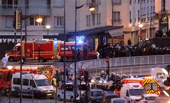 French police on Friday killed the two brothers suspected of murdering 12 people at a Paris newspaper and freed their hostage unharmed from a Kosher market. (Associated Press)