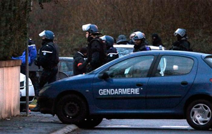 The police launched a simultaneous raid on a kosher supermarket in Paris where an alleged associate of the brothers had held an unnamed number of hostages. (Associated Press)