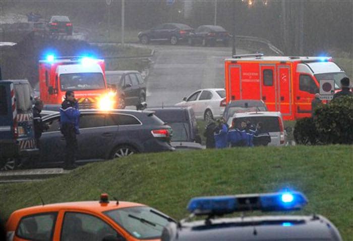 Ambulances arrive in Dammartin-en-Goele, northeast Paris, were two heavily armed suspects were killed on Friday. (Associated Press)