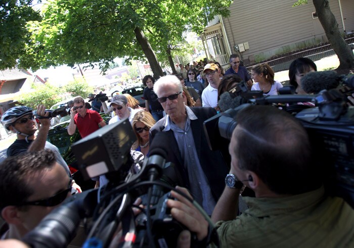 The wedding venue buzzed with activity, hundreds gathered outside to catch a glimpse of the elite guests. Adding to the frenzy were various media representatives from across the globe.<br><br> In this picture actor Ted Danson can be seen surrounded by reporters as he arrived with his wife Mary Steenburgen. (AP Photo)