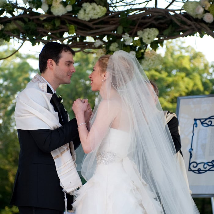 Chelsea Clinton and Marc Mezvinsky the newlywed couple share a private moment  during their wedding on Saturday, July 31, 2010 in Rhinebeck, New York.(AP Photo)