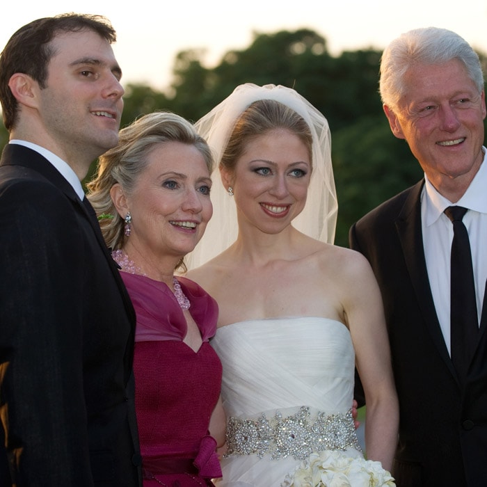 Marc Mezvinsky is an investment banker by profession. Chelsea and Marc are said to be friends since childhood however, they started dating only a few years back.<br><br>In this picture, Marc is seen with his new mother-in-law Hillary Rodham Clinton, his bride Chelsea  and father-in-law former President Bill Clinton after the couple's wedding. (AP Photo)