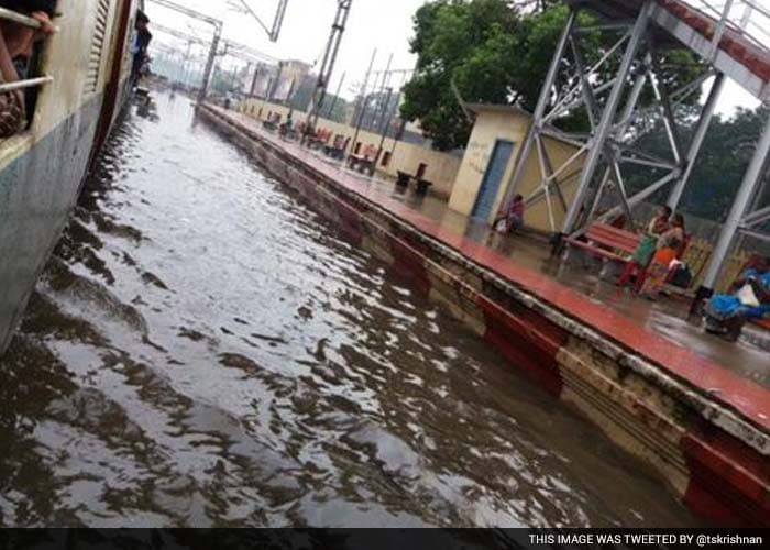 Heavy rain through the night has submerged rail tracks, resulting in delays in arrival and departure of trains at the Chennai Central Station.