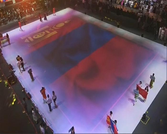 With an orchestra playing pulsating music, teams from dozens of countries including Japan, China, Australia, Germany, Italy, South Africa, Austria, Albania, Algeria, Angola, Argentina, and Barbados were welcomed to unceasing rounds of applause in the stadium.