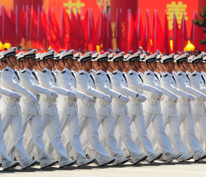 <p>Chinese People's Liberation Army (PLA) naval officers march pass Tiananmen Square during the National Day parade in Beijing on October 1, 2009. China formally kicked off mass celebrations of 60 years of communist rule with a 60-gun salute that rung out across Beijing's historic Tiananmen Square. AFP PHOTO</p>
<a class="text2bold_link" href="http://www.ndtv.com/convergence/ndtv/new/NDTV-Show-Special.aspx?ID=362">China at 60: Live Blogs</a>