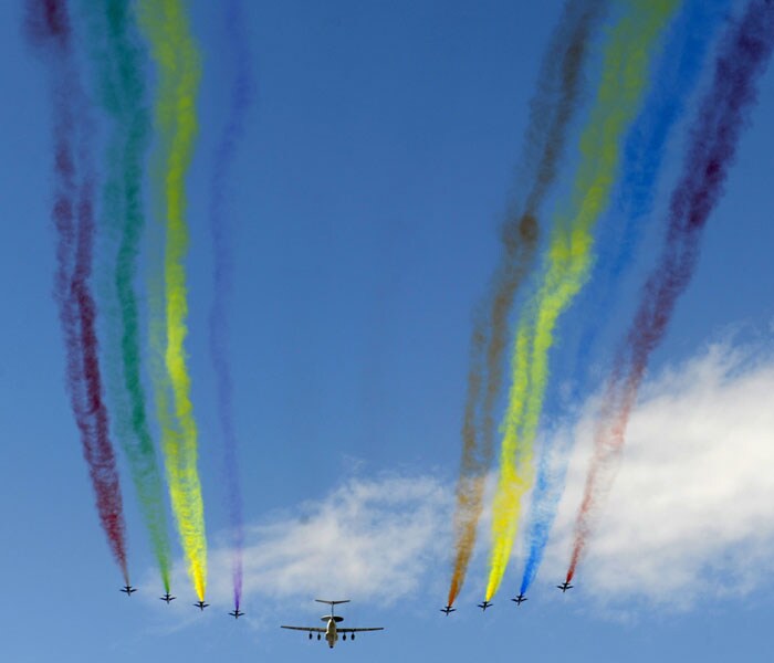 <p>Chinese Air Force fighter jets fly over during the National Day parade in Beijing on October 1, 2009. China formally kicked off mass celebrations of 60 years of communist rule with a 60-gun salute that rung out across Beijing's historic Tiananmen Square. AFP PHOTO </p>
<p><a class="text2bold_link" href="http://www.ndtv.com/convergence/ndtv/new/NDTV-Show-Special.aspx?ID=362">China at 60: Live Blogs</a></p>