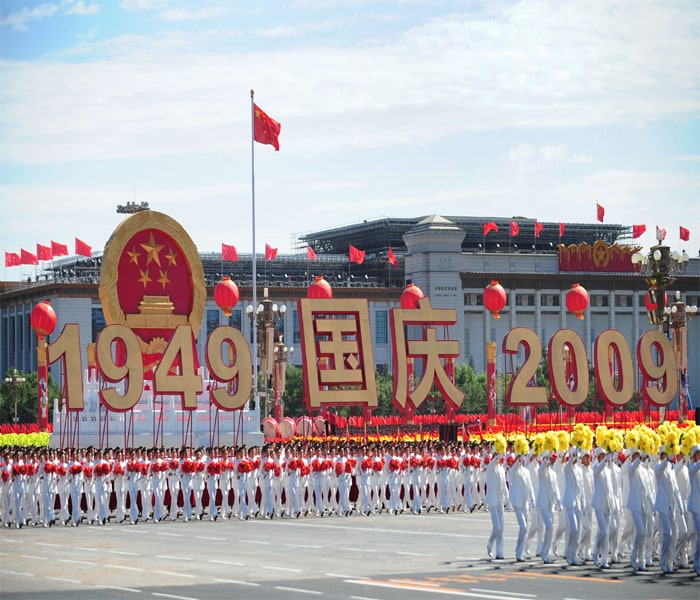 <p>People perform during National Day celebrations in Beijing on October 1, 2009. China formally kicked off mass celebrations of 60 years of communist rule with a 60-gun salute that rung out across Beijing's historic Tiananmen Square but due to security concerns most of Beijing's 17 million citizens were relegated to watching the pageant in their hometown on television like the rest of China. AFP PHOTO </p>
<p><a class="text2bold_link" href="http://www.ndtv.com/convergence/ndtv/new/NDTV-Show-Special.aspx?ID=362">China at 60: Live Blogs</a></p>