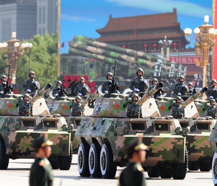 <p>Tanks and militia parade along the Avenue of Eternal Peace (Chang'An Avenue) past Tiananmen Square during National Day celebrations in Beijing on October 1, 2009. China celebrated 60 years of communist rule with a military parade and lavish ceremonies showcasing the nation's revival as a global power. AFP PHOTO</p>
<a class="text2bold_link" href="http://www.ndtv.com/convergence/ndtv/new/NDTV-Show-Special.aspx?ID=362">China at 60: Live Blogs</a>