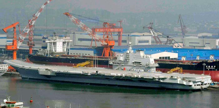 China has spent the better part of a decade refurbishing the carrier formerly known as the Varyag after it was towed from Ukraine in 1998, minus its engines, weaponry, and navigation systems.<br><br>Beijing's carrier program is seen as the natural outgrowth of the country's burgeoning military expansion, fed by two decades of near-continuous, double-digit percentage increases in the defense budget. China's announced military spending rose to $91.5 billion last year, the second highest in the world after the United States.<br><br>While Chinese carriers could challenge U.S. naval supremacy in Asia, China still has far to go in bringing such systems into play, experts said. The U.S. operates 11 aircraft carrier battle groups and has been shifting naval assets to the Pacific.