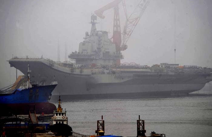 A statement posted on the website of the Liaoning Maritime Safety Authority said vessels will be barred from entering a small section of the sea off Dalian until 6 pm on Sunday.<br><br>Positioning a carrier off its coast would boost the range of China's naval aircraft, increasing their ability to hit U.S. bases in Japan, South Korea, and possibly Guam.<br><br>Beijing is believed to be developing a carrier version of the Russian Su-33, dubbed the J-15, a step that has angered defense officials in Moscow who accuse China or stealing their defense technology.