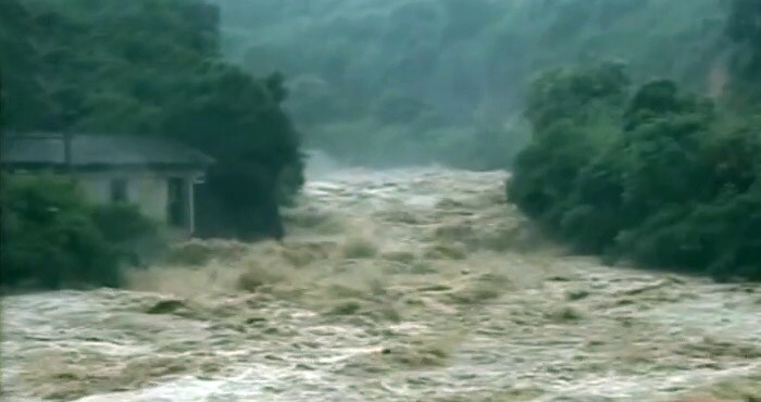 State Television reported disruptions to rail links after landslides swept away some of the track in Fujian province. (AP Image)