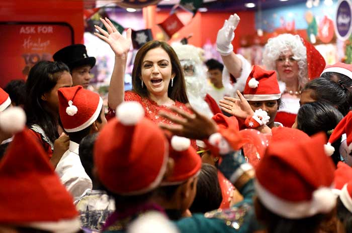 Nita Ambani, Founder and Chairperson, Reliance Foundation during christmas celebration with underprivileged children in Mumbai. (PTI Photos)