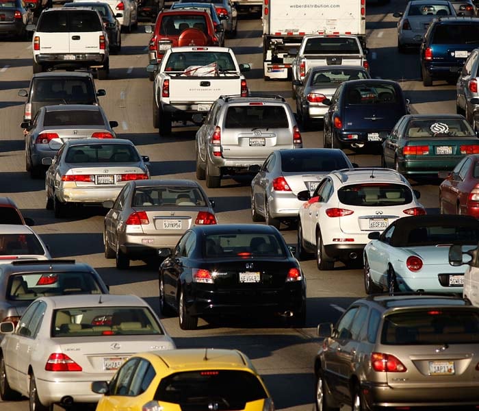 Morning commuters travel the 210 freeway between Los Angeles and cities to the east on December 1, 2009 near Pasadena, California. President Barack Obama will attend the international climate negotiations in Copenhagen next week with a vow to reduce US greenhouse gas emissions to about 17 per cent below 2005 levels by 2020, and 83 per cent by 2050.<br><br>Meanwhile, California, which has some of the toughest clean air laws after decades of fighting some of the worst smog in the nation, is in the final phase of building a cap-and-trade market to provide incentives to reduce greenhouse emissions. More than 60 world leaders are expected to take part in the climate negotiations in Copenhagen. (AFP photo)