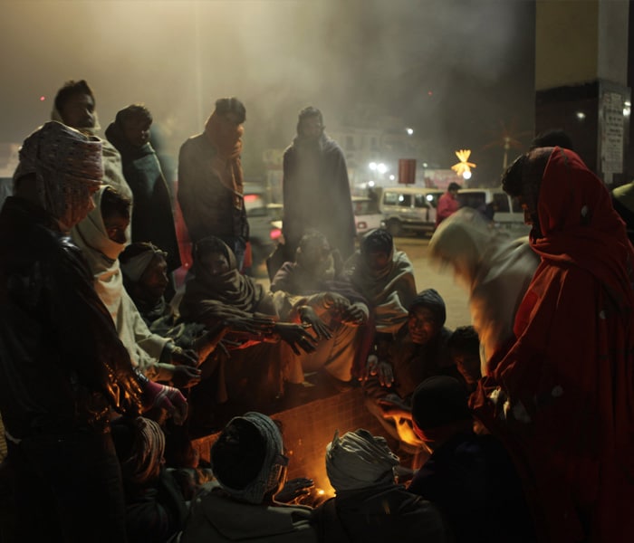 The ongoing cold wave worsened the plight of homeless people in the national capital as they have to struggle hard to stay alive. (AP photo)